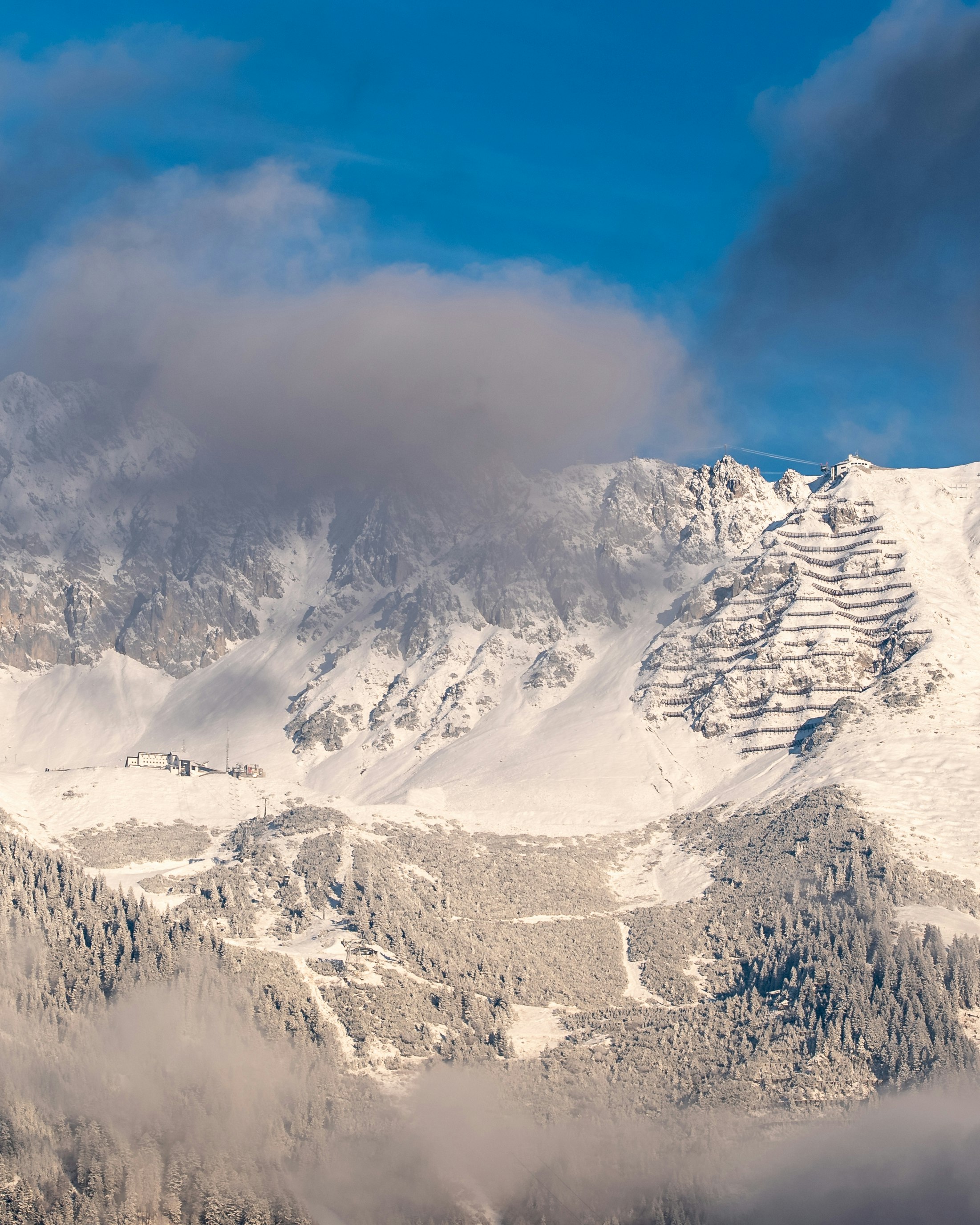 snow covered mountain during daytime